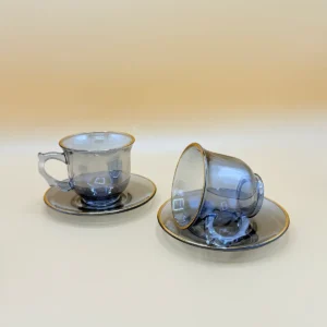 Set of 12 Transparent Faded Black Glass Tea Cups and Saucers